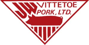 White triangle with a red outline and the words JW Vittetoe Pork, Ltd. and a red illustrated pig inside of it